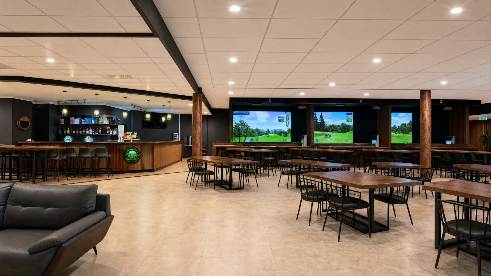 The Virtual Greens bar and dining floor, with three simulator bays along the back wall